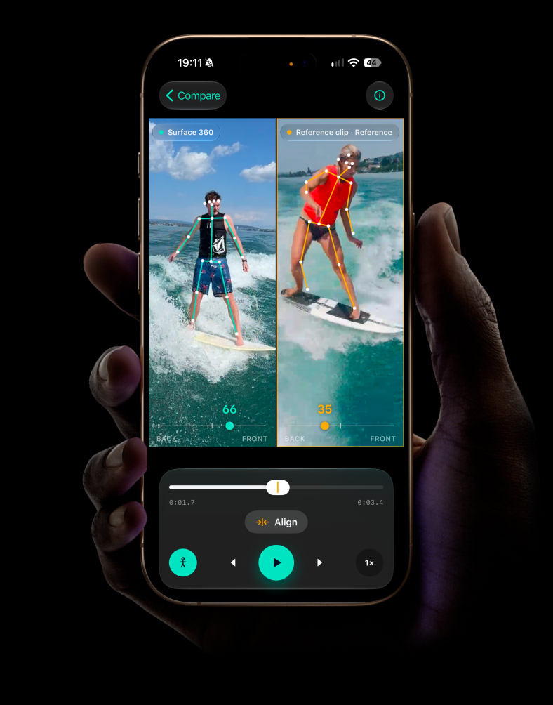 A hand holding a phone showing the WakeLab app comparing a wakesurf run frame by frame